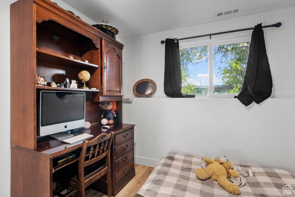 Bedroom featuring light wood-type flooring