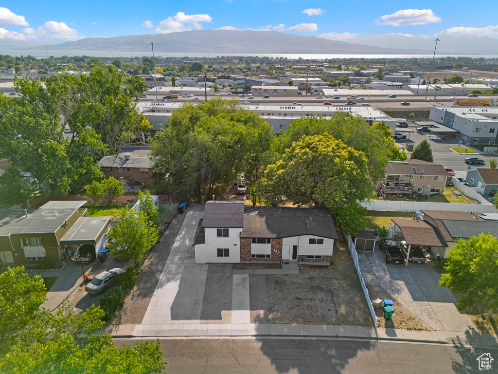 Aerial view of residential area with a mountain backdrop