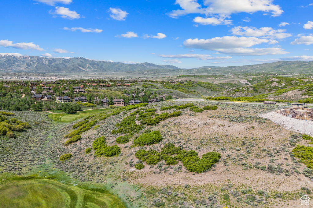 View of mountain backdrop with a local golf course