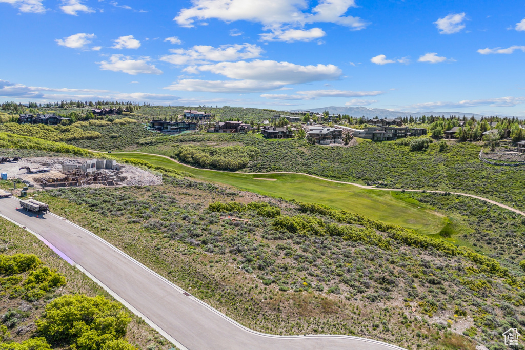 Aerial view of mountains and a golf course