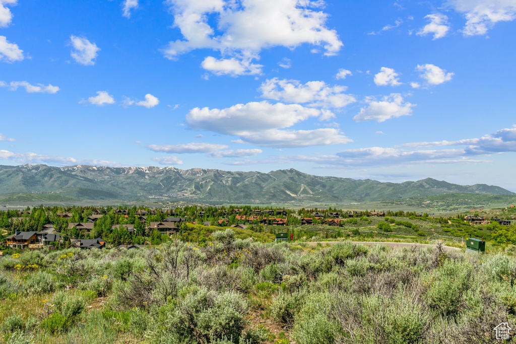 Mountain view featuring nearby suburban area