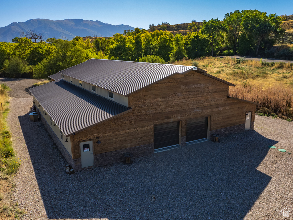 View of subject property with a mountainous background
