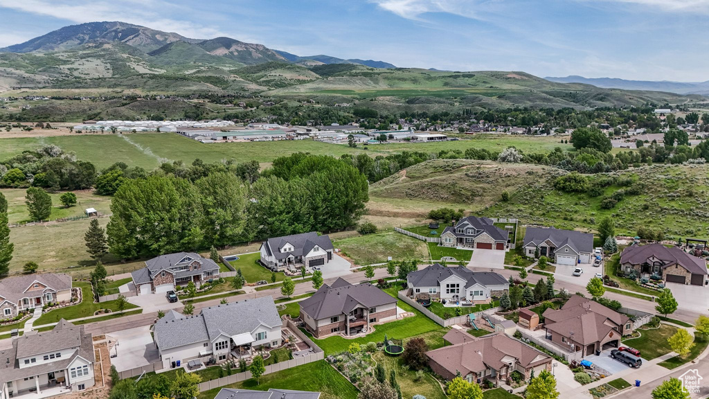 Aerial view of residential area with a mountain backdrop