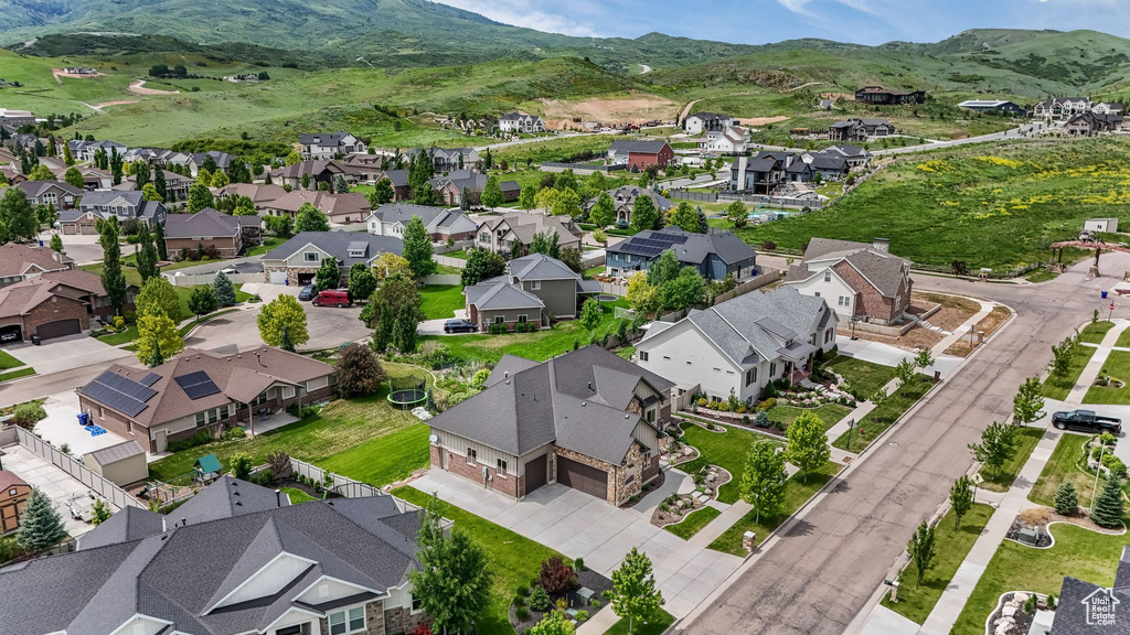 Aerial view of residential area with mountains