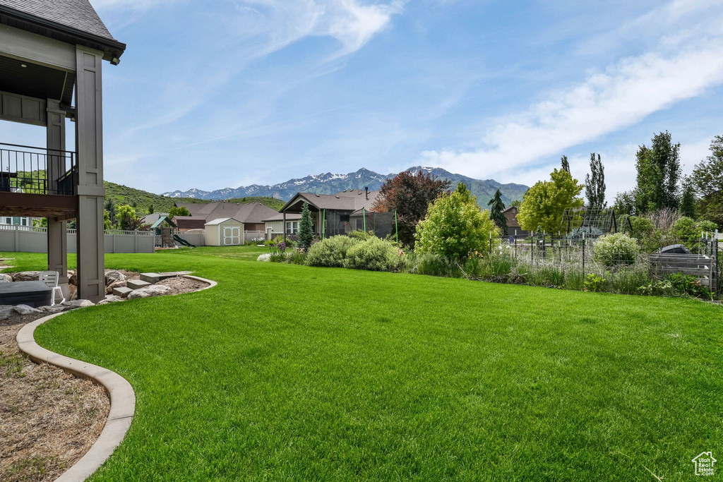 View of yard featuring a mountain view and a residential view