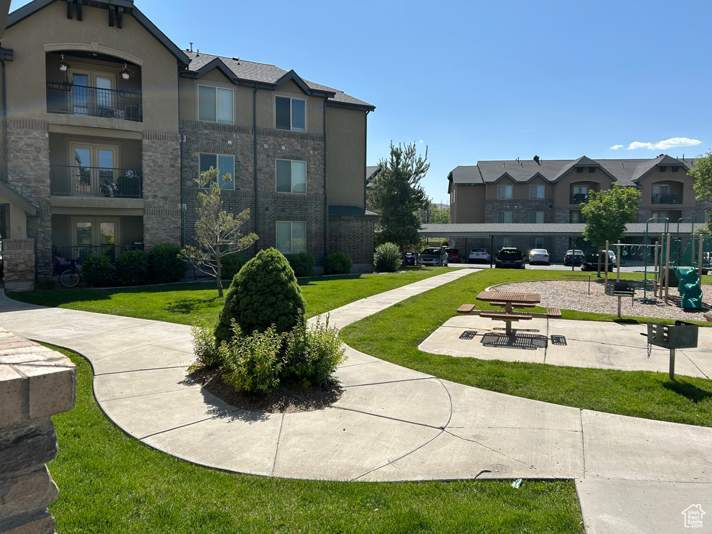Surrounding community featuring a lawn