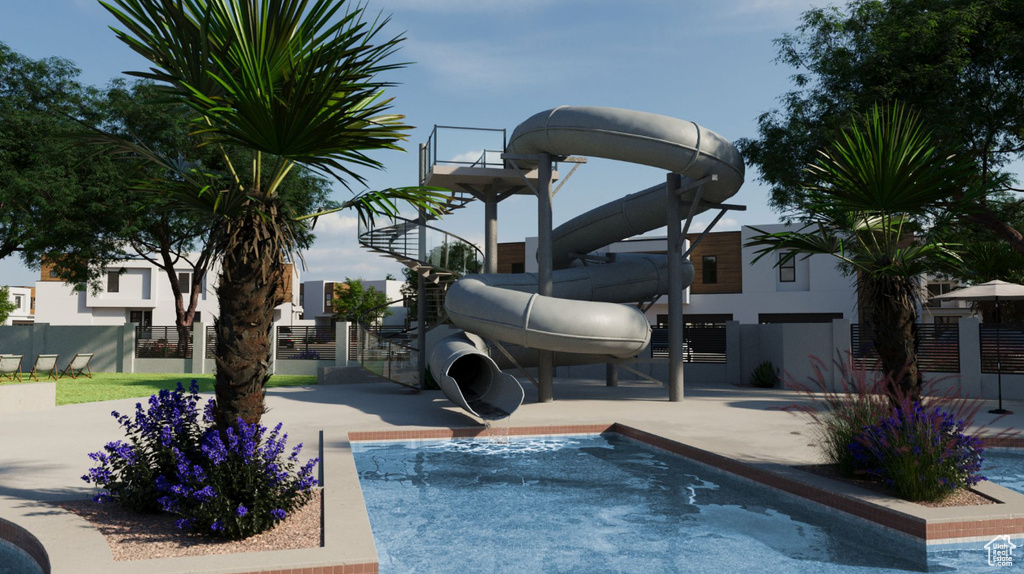 Swimming pool featuring a hot tub