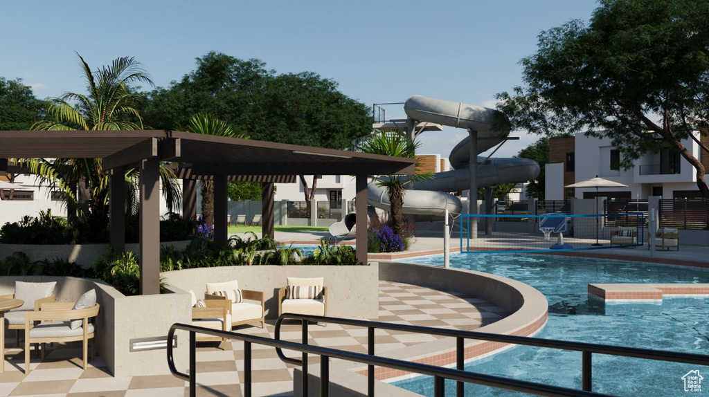 Community pool with a patio