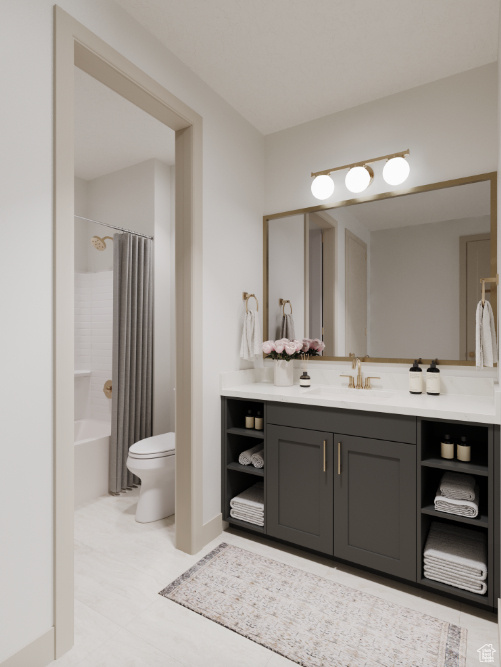 Full bathroom featuring toilet, vanity, and shower / tub combo with curtain