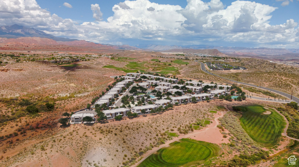 Aerial view of property's location with mountains and a desert landscape