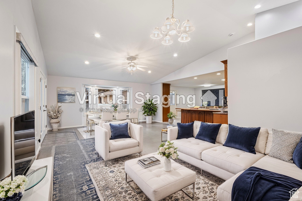 Living room with vaulted ceiling, recessed lighting, baseboards, and a chandelier