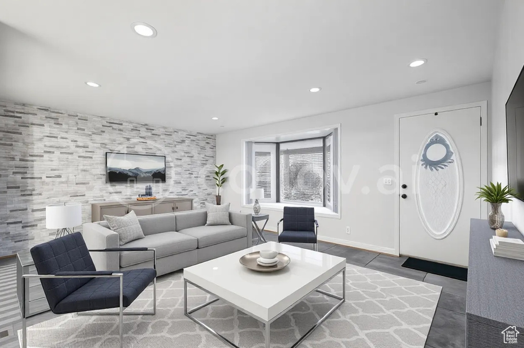 Living room featuring recessed lighting and plenty of natural light