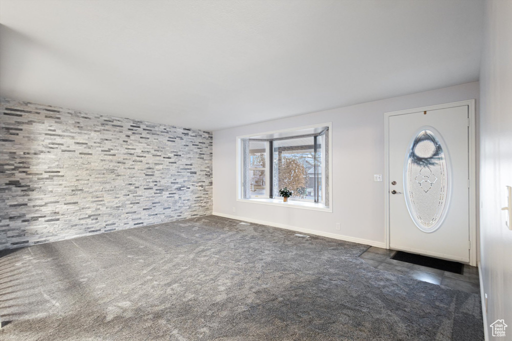 View of carpeted entrance foyer