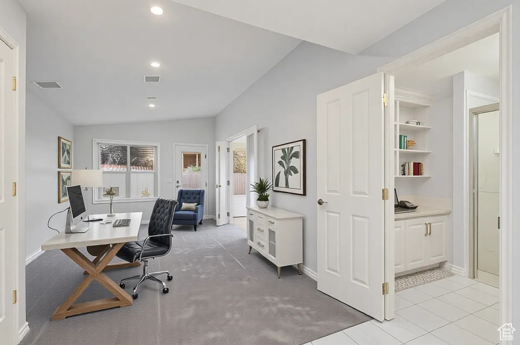 Office featuring recessed lighting, baseboards, vaulted ceiling, and light carpet