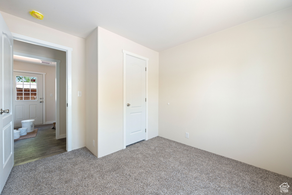 Unfurnished bedroom featuring carpet flooring