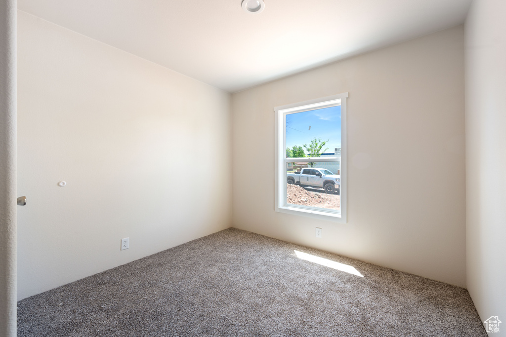 Empty room featuring carpet floors