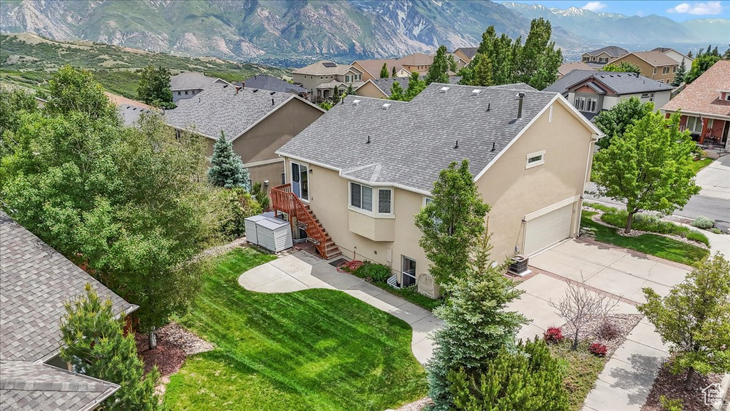 Aerial view of residential area with mountains