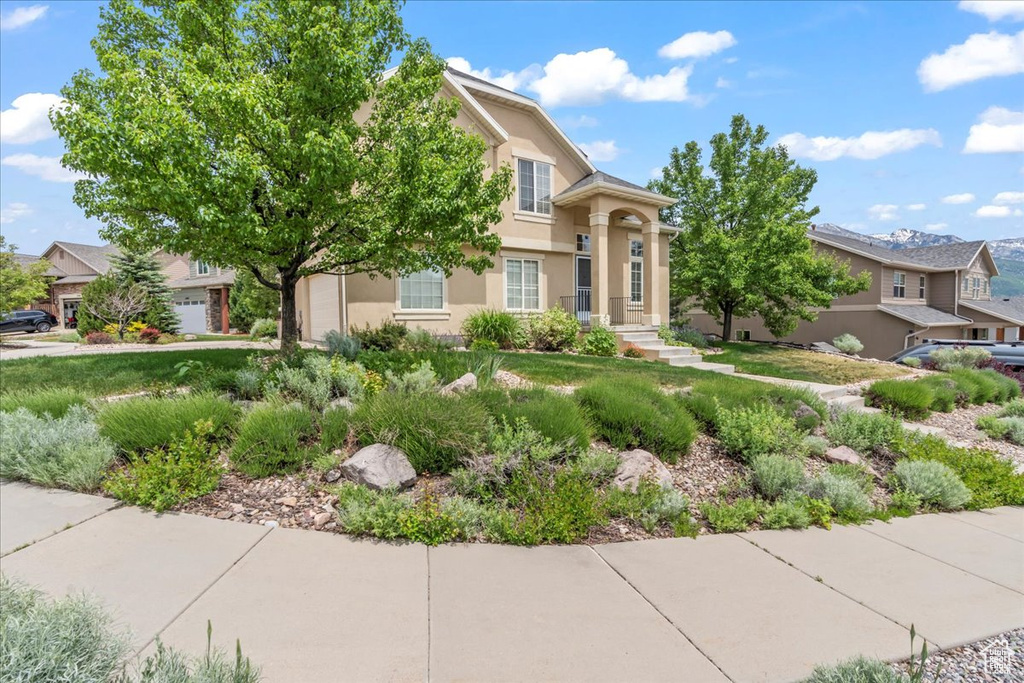 View of front of home featuring stucco siding