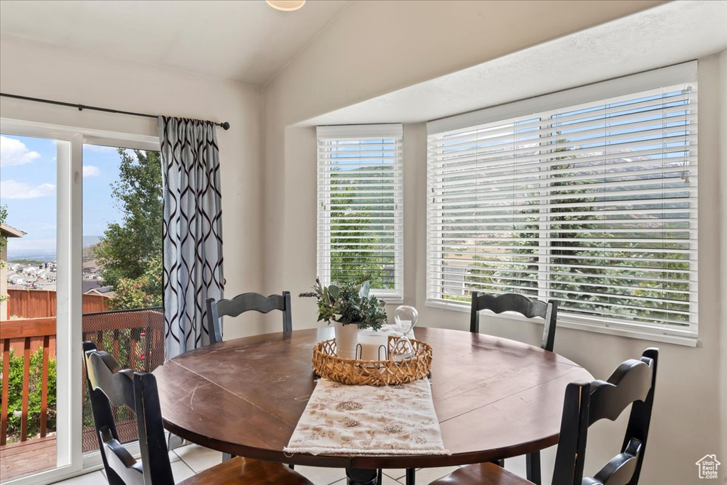 Dining area with vaulted ceiling