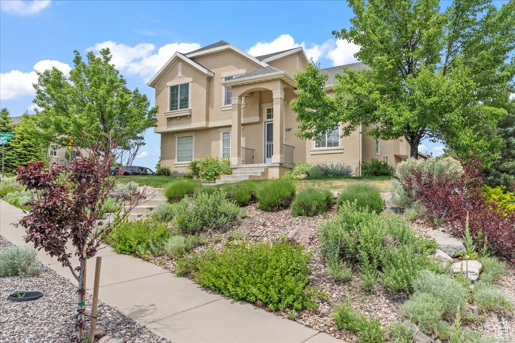View of front of home with stucco siding