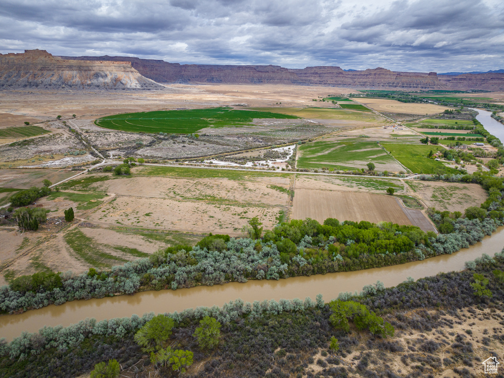 Aerial view of sparsely populated area featuring a mountainous background