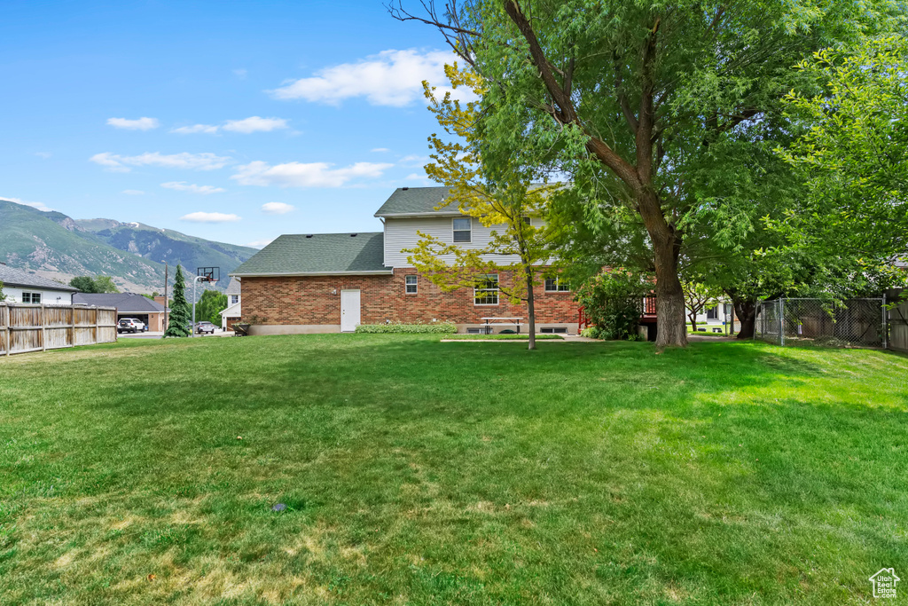 View of yard featuring a mountain view