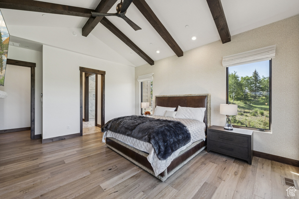 Bedroom with baseboards, light wood-style flooring, multiple windows, and ceiling fan