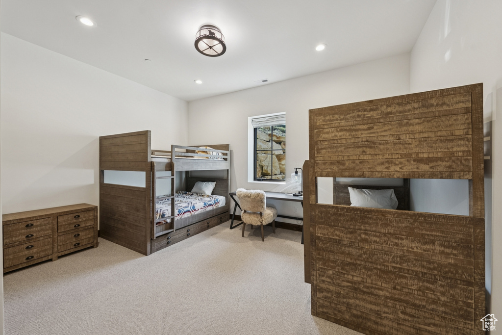 Carpeted bedroom featuring recessed lighting