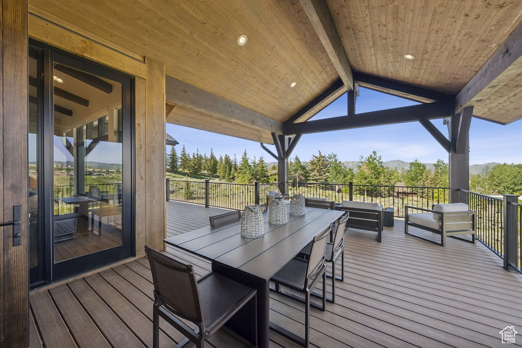 Wooden deck featuring a mountain view
