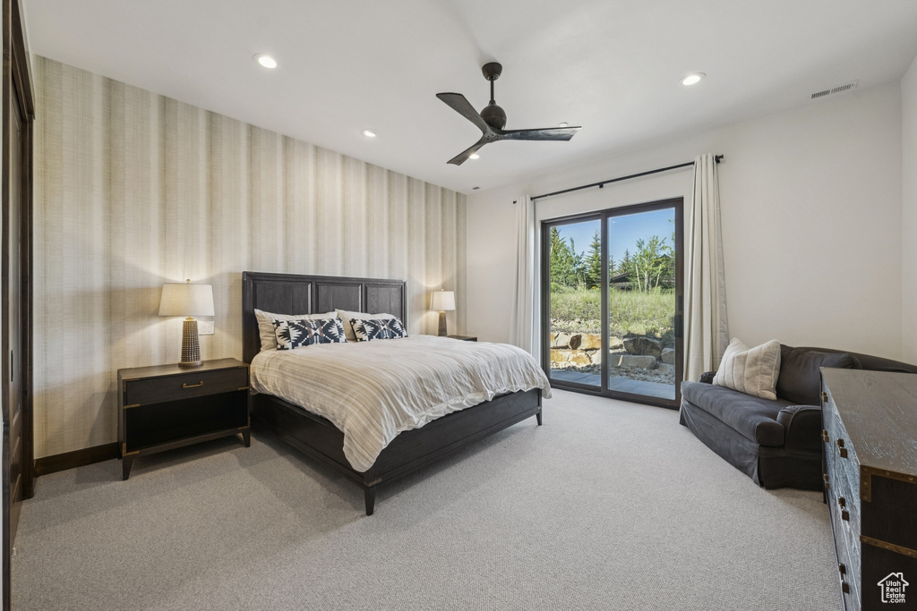 Bedroom with access to exterior, carpet, wallpapered walls, recessed lighting, and a ceiling fan