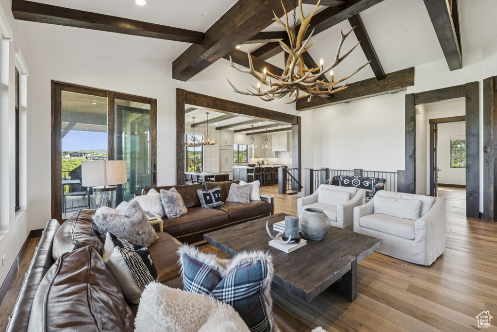 Living room with a chandelier and wood finished floors