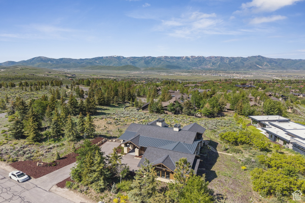 View of subject property with mountains