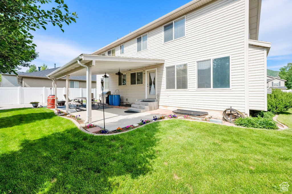 Back of property featuring a patio