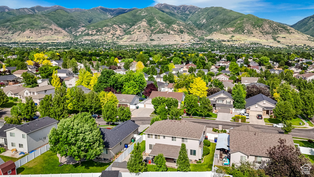 Aerial view of residential area with a mountainous background