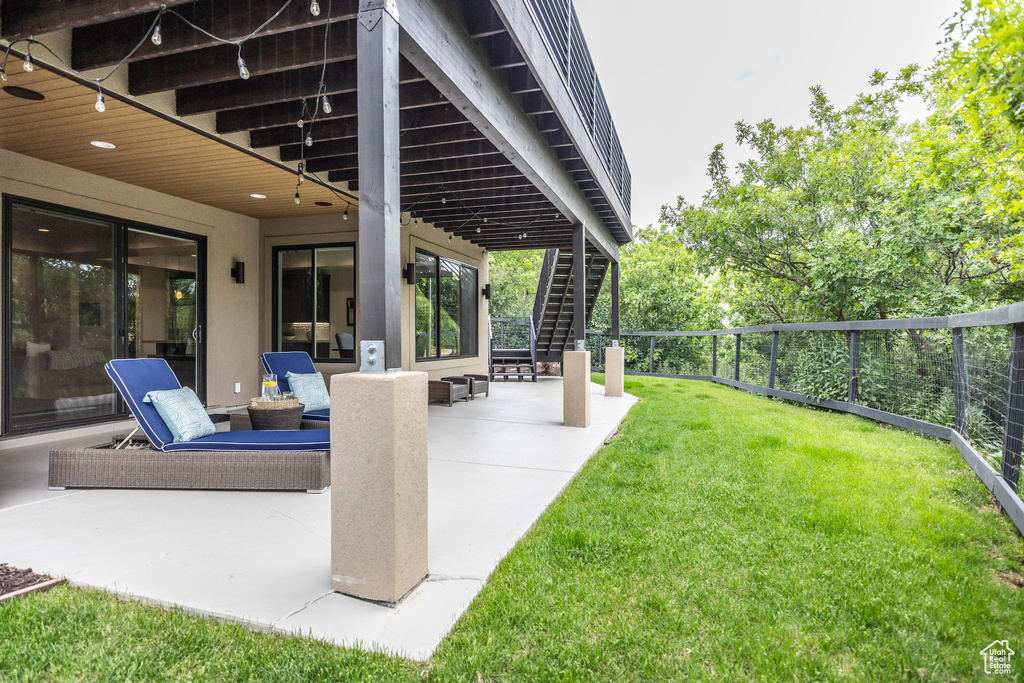 View of patio with stairs
