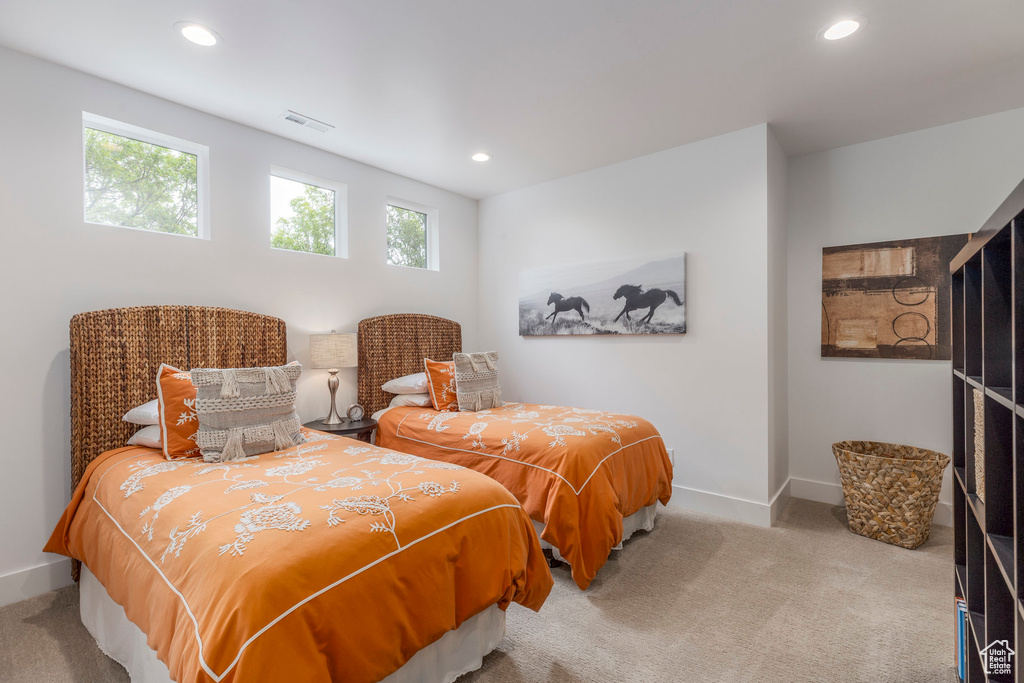 Bedroom with carpet, baseboards, and recessed lighting