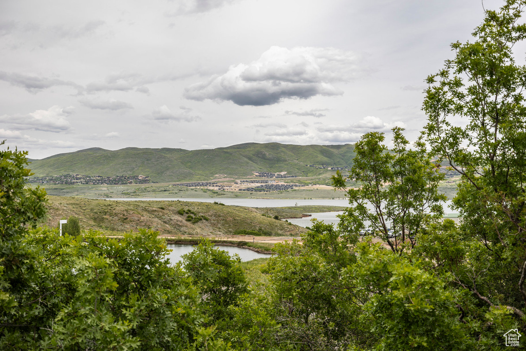 Mountain view with a nearby body of water