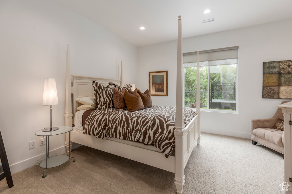 Bedroom featuring carpet, baseboards, and recessed lighting