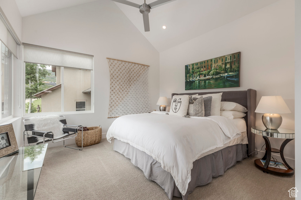 Bedroom with carpet, high vaulted ceiling, recessed lighting, baseboards, and ceiling fan
