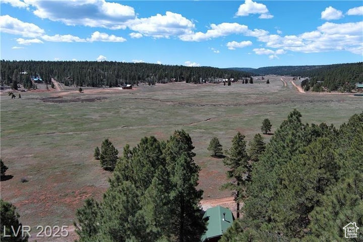 View of rural area featuring a forest