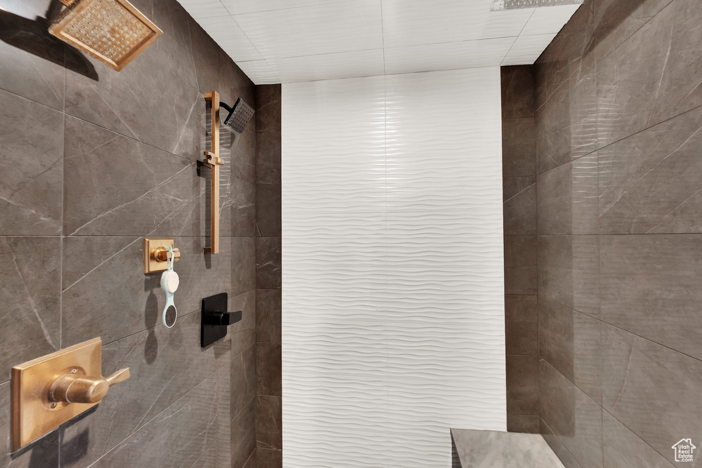 Bathroom view of a tile shower