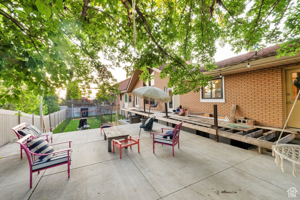 Fenced backyard featuring a patio area