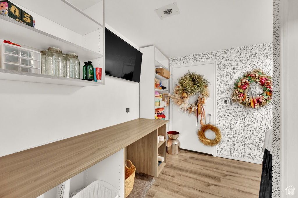 Mudroom with wood finished floors