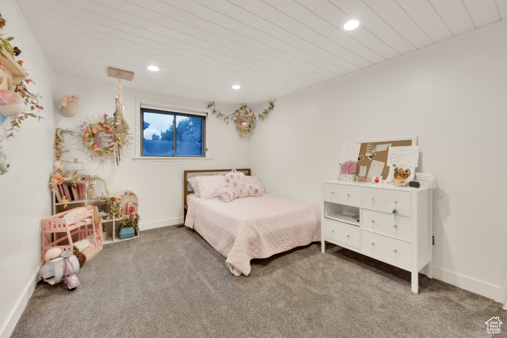 Bedroom featuring carpet floors, recessed lighting, baseboards, and wood ceiling