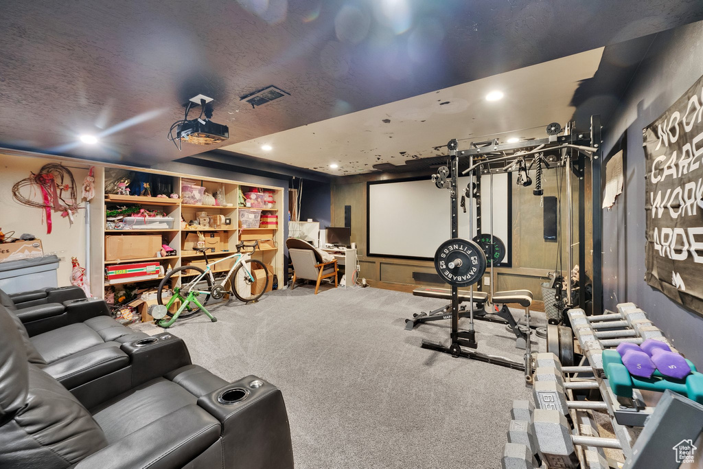 Cinema room featuring carpet flooring and recessed lighting