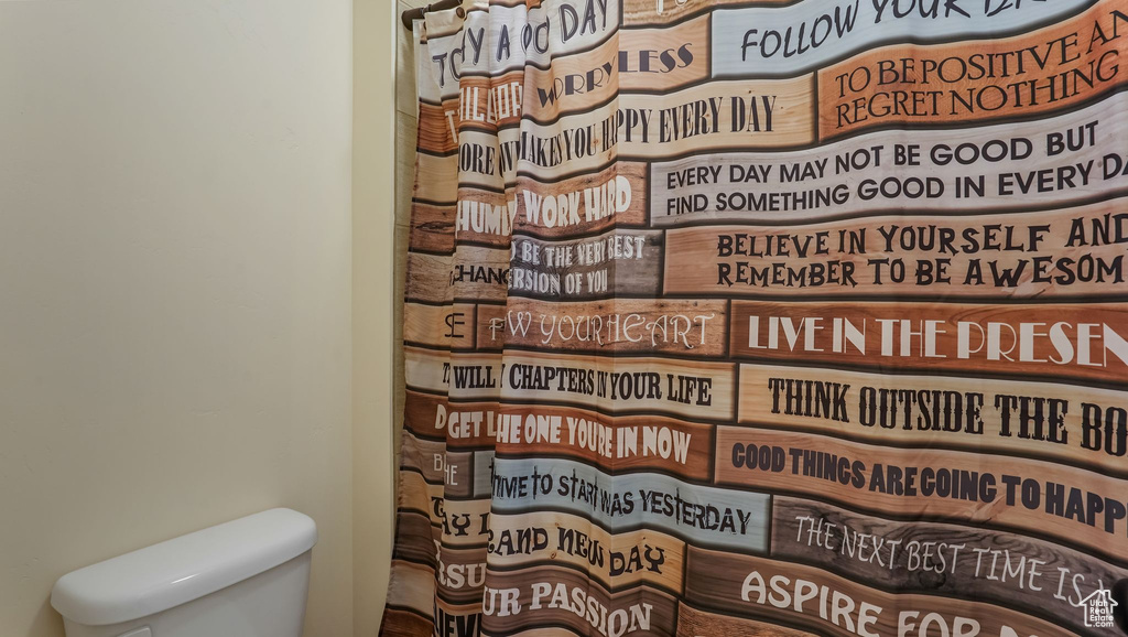Full bathroom with toilet