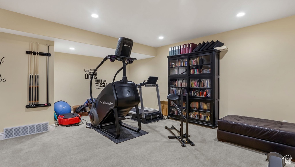 Exercise area featuring carpet floors, recessed lighting, and baseboards