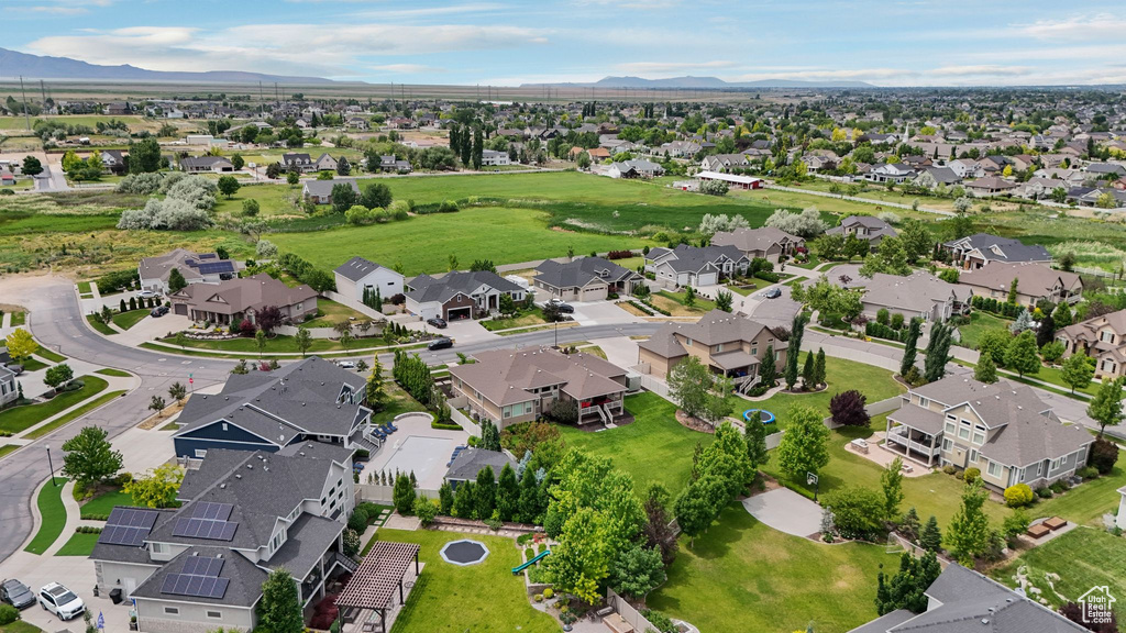 Aerial view of residential area with a mountain backdrop