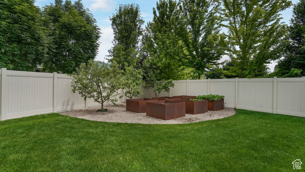 View of yard featuring a vegetable garden