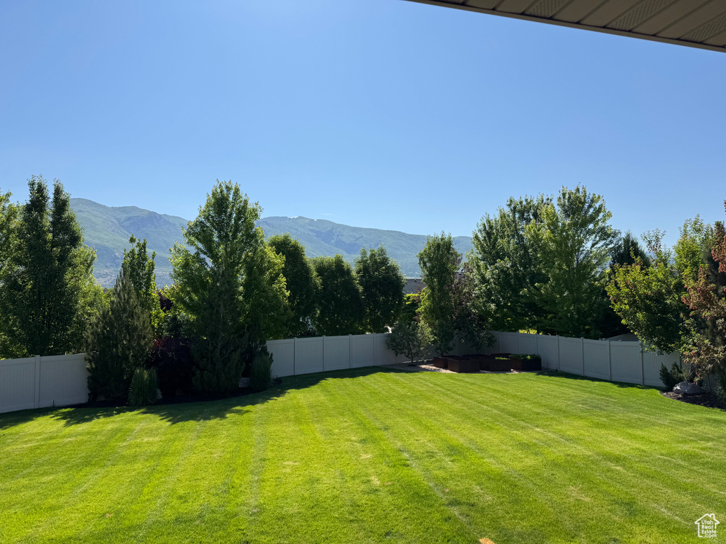 View of yard with a mountain view
